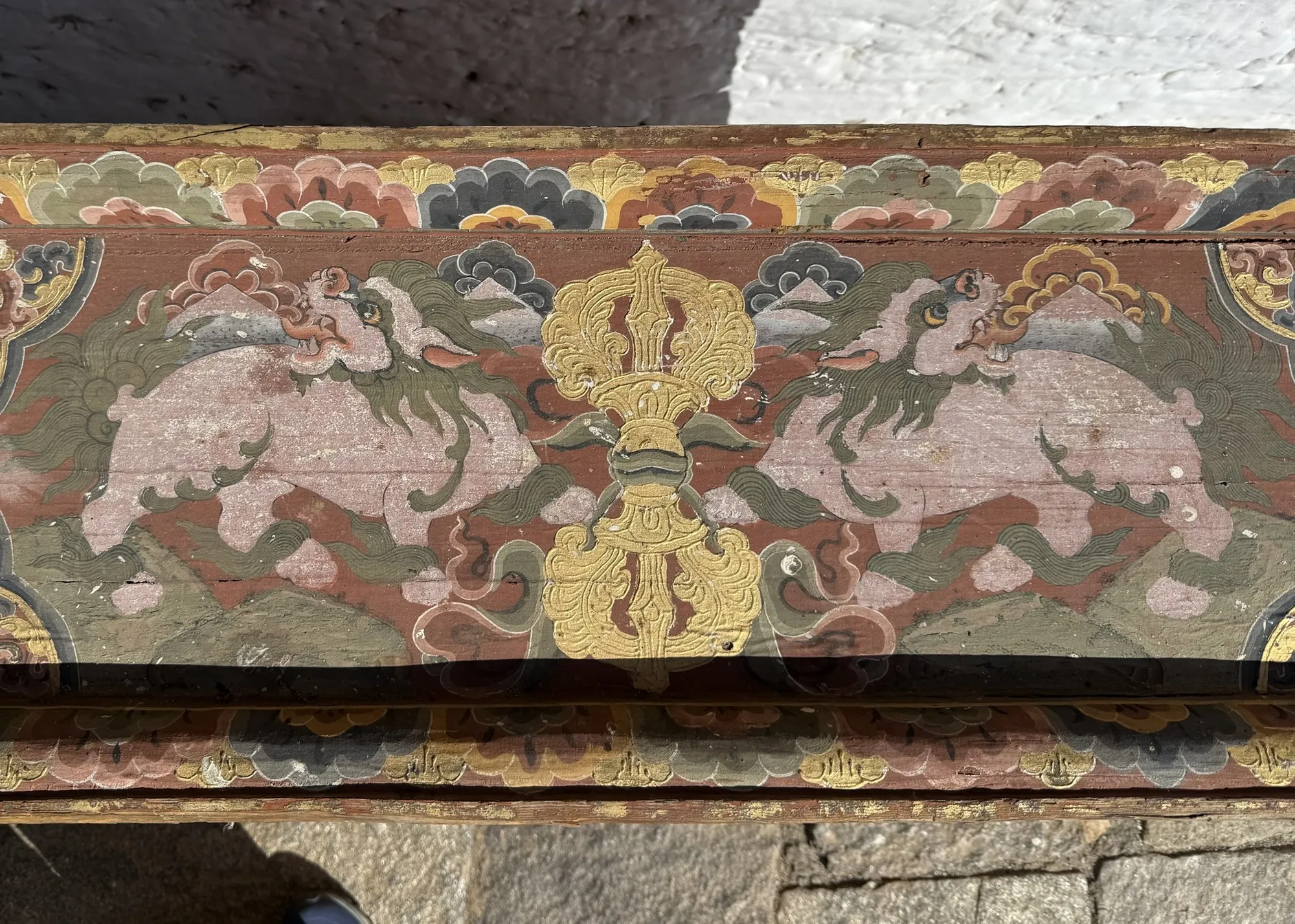 A painted frieze of snow lions