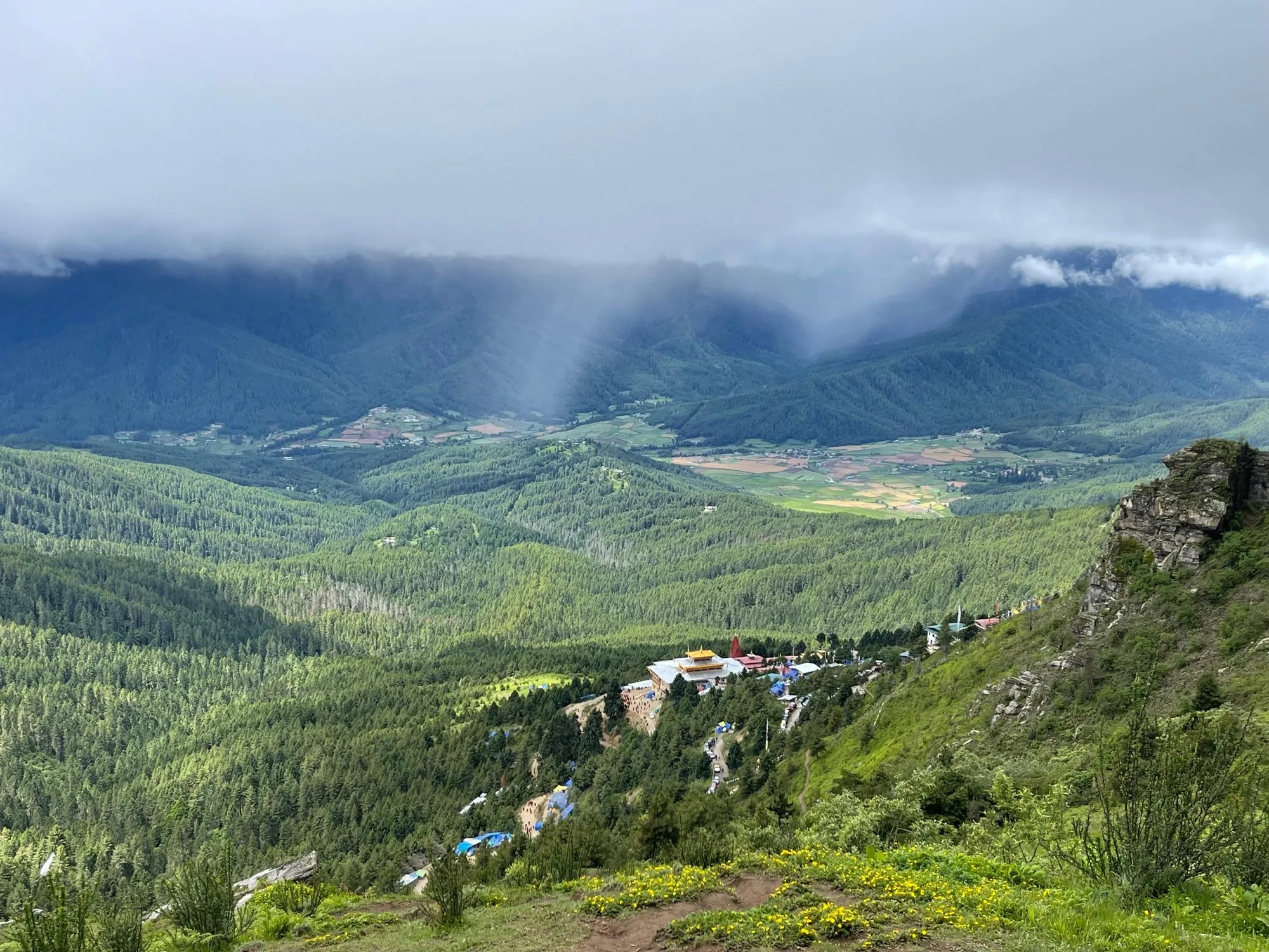 View down onto Tharpaling Monastery from the mountainside above